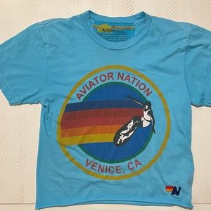Teal blue XS kids Aviator Nation T-Shirt. Light wear stain/back.  Pic enclosed